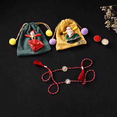 Handcrafted Kundan Bhaiya Bhabhi Rakhi Set with Potli 75
