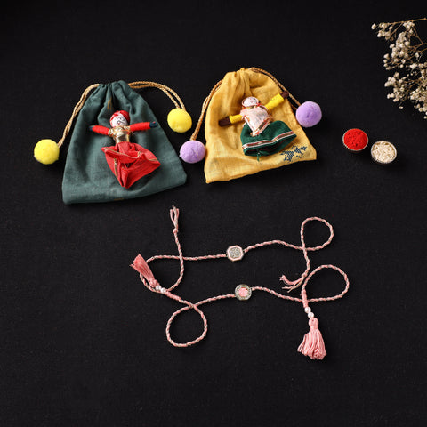 Handcrafted Kundan Bhaiya Bhabhi Rakhi Set with Potli 77