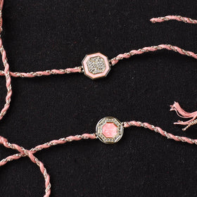 Handcrafted Kundan Bhaiya Bhabhi Rakhi Set with Potli 77