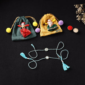 Handcrafted Kundan Bhaiya Bhabhi Rakhi Set with Potli 78