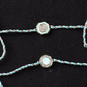 Handcrafted Kundan Bhaiya Bhabhi Rakhi Set with Potli 78