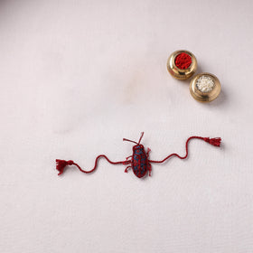 Cockroach - Reusable Handmade Threadwork Rakhi with Potli 07