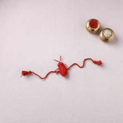 Cockroach - Reusable Handmade Threadwork Rakhi with Potli 01