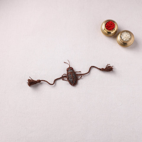 Cockroach - Reusable Handmade Threadwork Rakhi with Potli 02