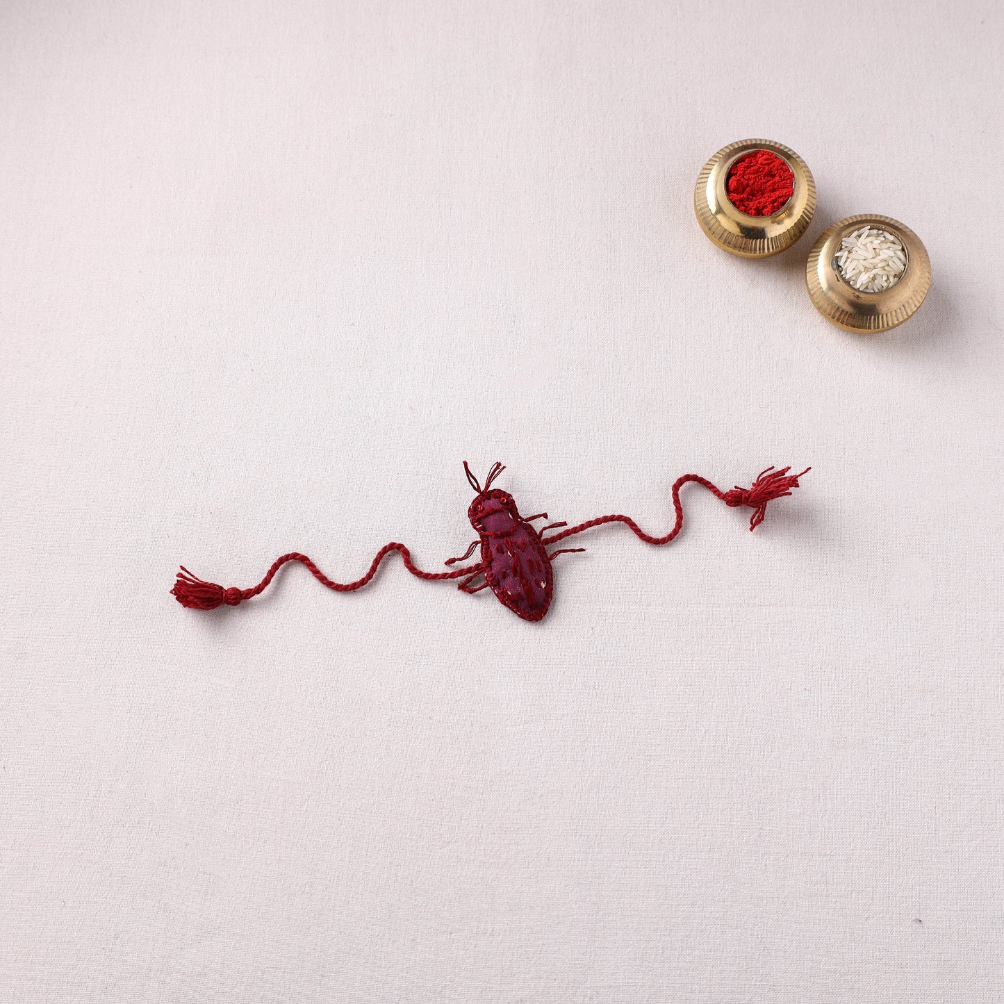 Cockroach - Reusable Handmade Threadwork Rakhi with Potli 03