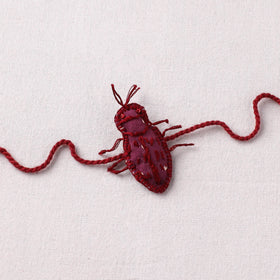 Cockroach - Reusable Handmade Threadwork Rakhi with Potli 03