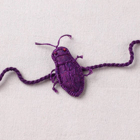 Cockroach - Reusable Handmade Threadwork Rakhi with Potli 04