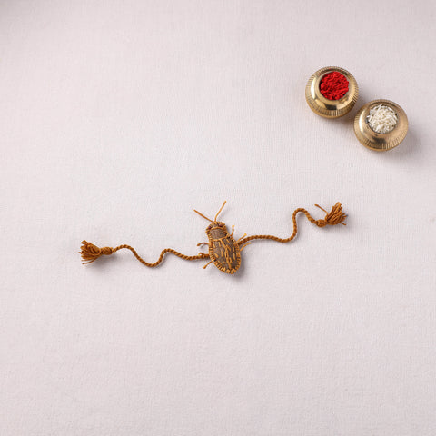 Cockroach - Reusable Handmade Threadwork Rakhi with Potli 06