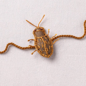 Cockroach - Reusable Handmade Threadwork Rakhi with Potli 06