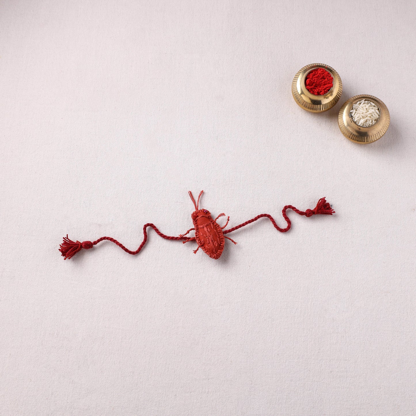 Cockroach - Reusable Handmade Threadwork Rakhi with Potli 08