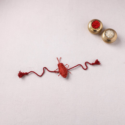 Cockroach - Reusable Handmade Threadwork Rakhi with Potli 08