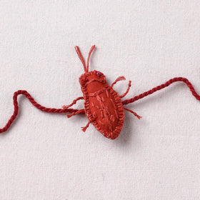 Cockroach - Reusable Handmade Threadwork Rakhi with Potli 08