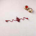 Cockroach - Reusable Handmade Threadwork Rakhi with Potli 09