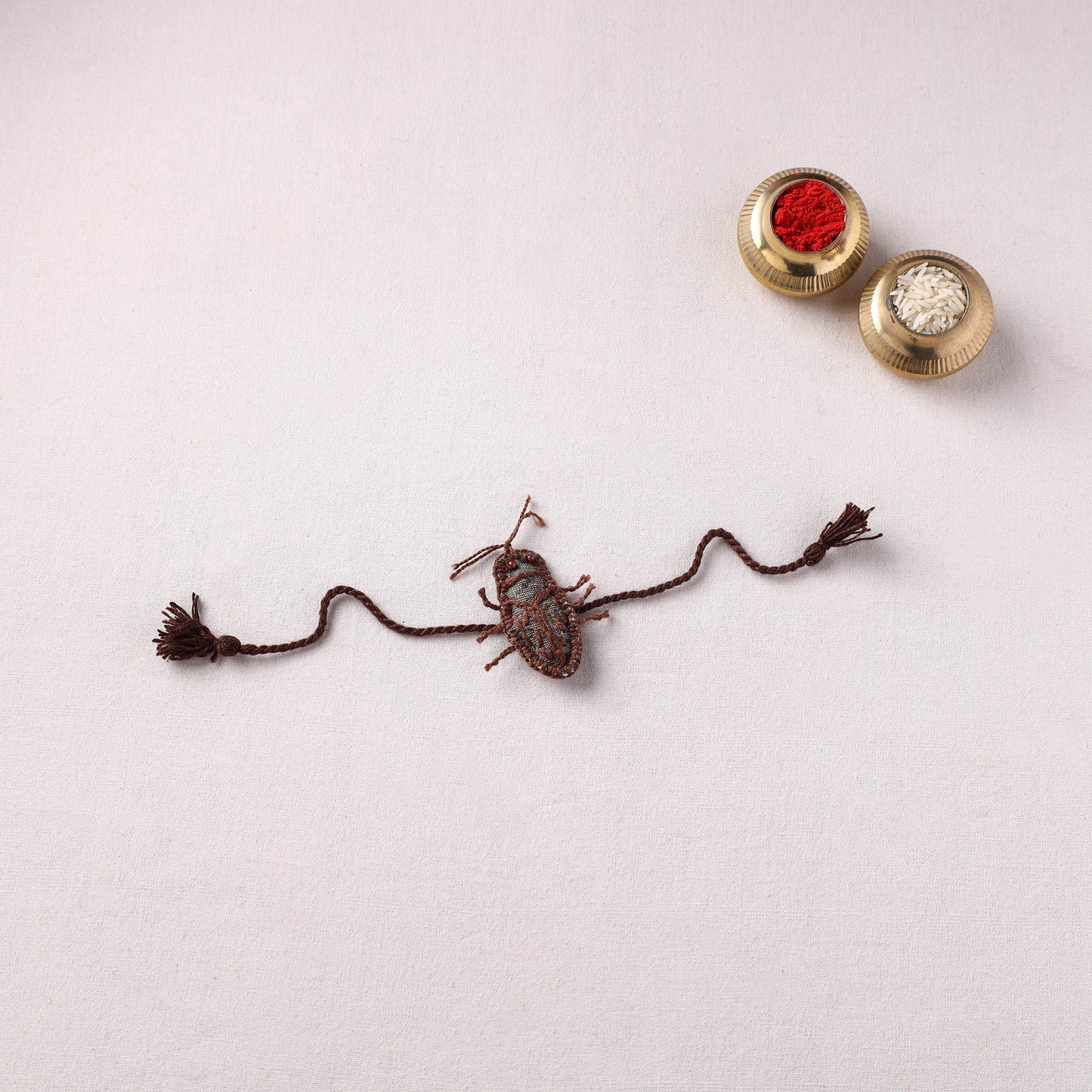 Cockroach - Reusable Handmade Threadwork Rakhi with Potli  13