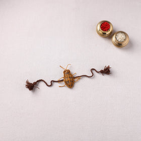 Cockroach - Reusable Handmade Threadwork Rakhi with Potli  16