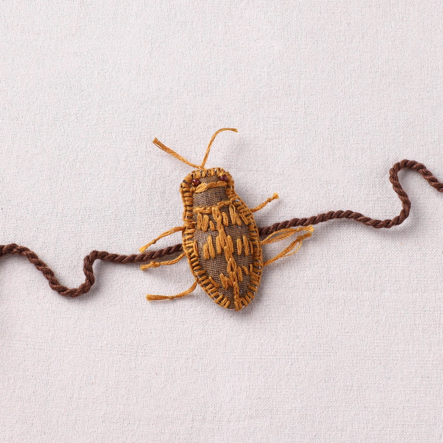 Cockroach - Reusable Handmade Threadwork Rakhi with Potli  16