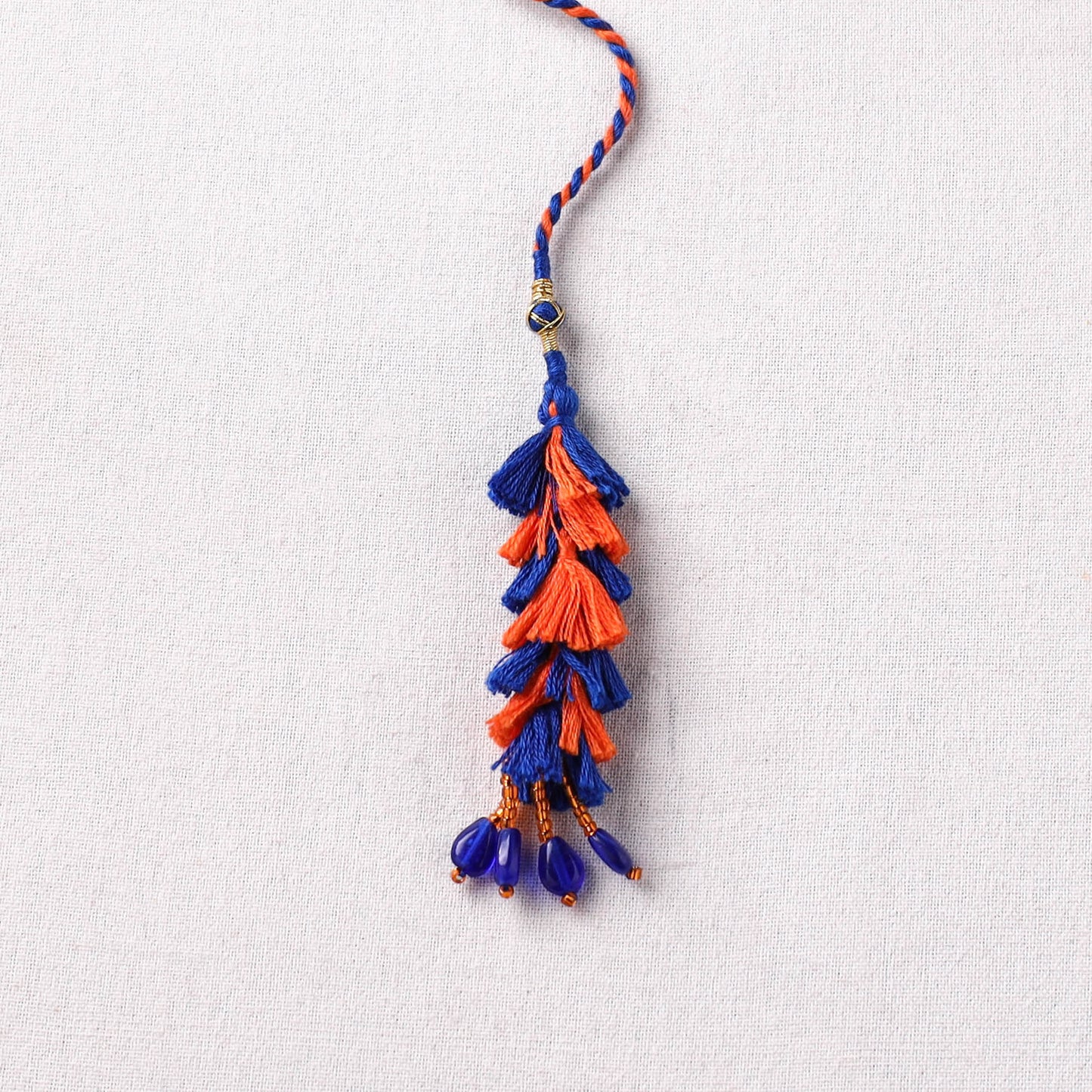 Handmade Thread Work Lumba Rakhi with Potli 03