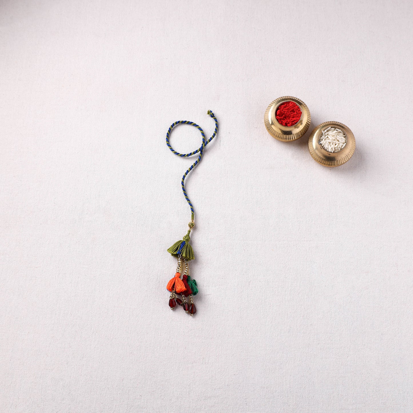 Handmade Thread Work Lumba Rakhi with Potli 04