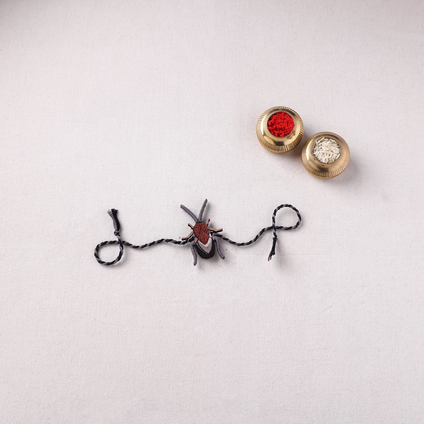 Cockroach - Reusable Handmade Threadwork Fabart Rakhi 01