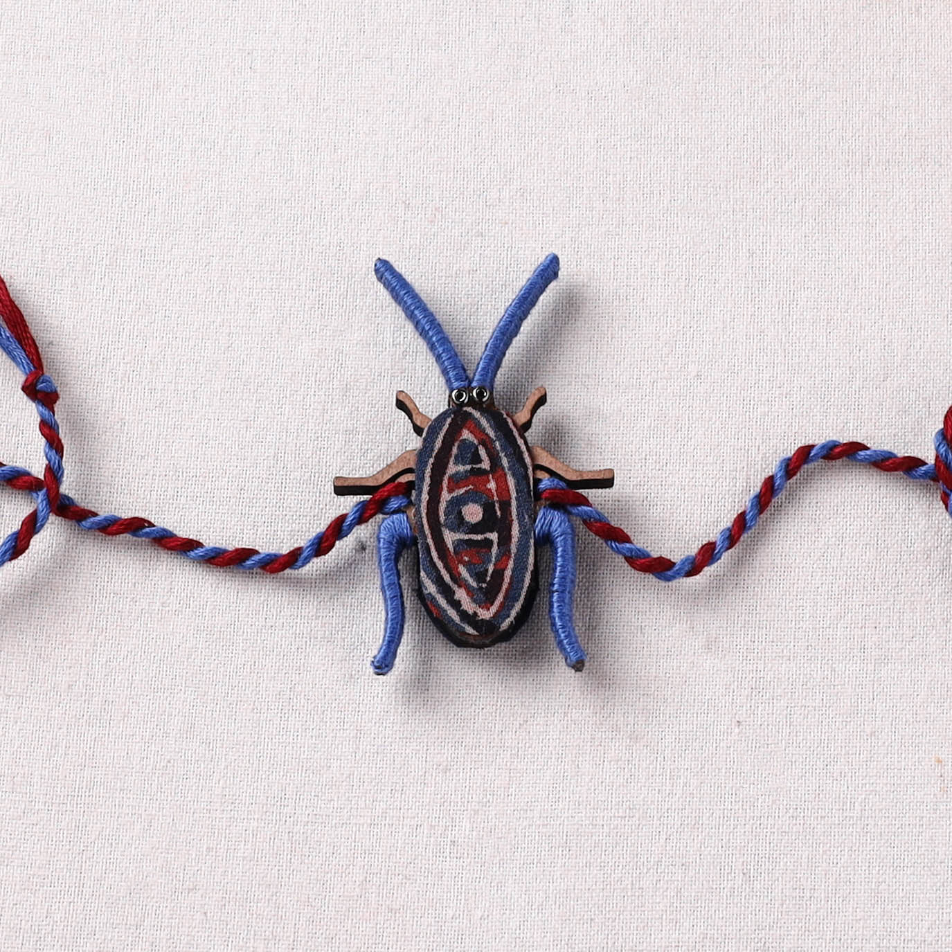 Cockroach - Reusable Handmade Threadwork Fabart Rakhi 02