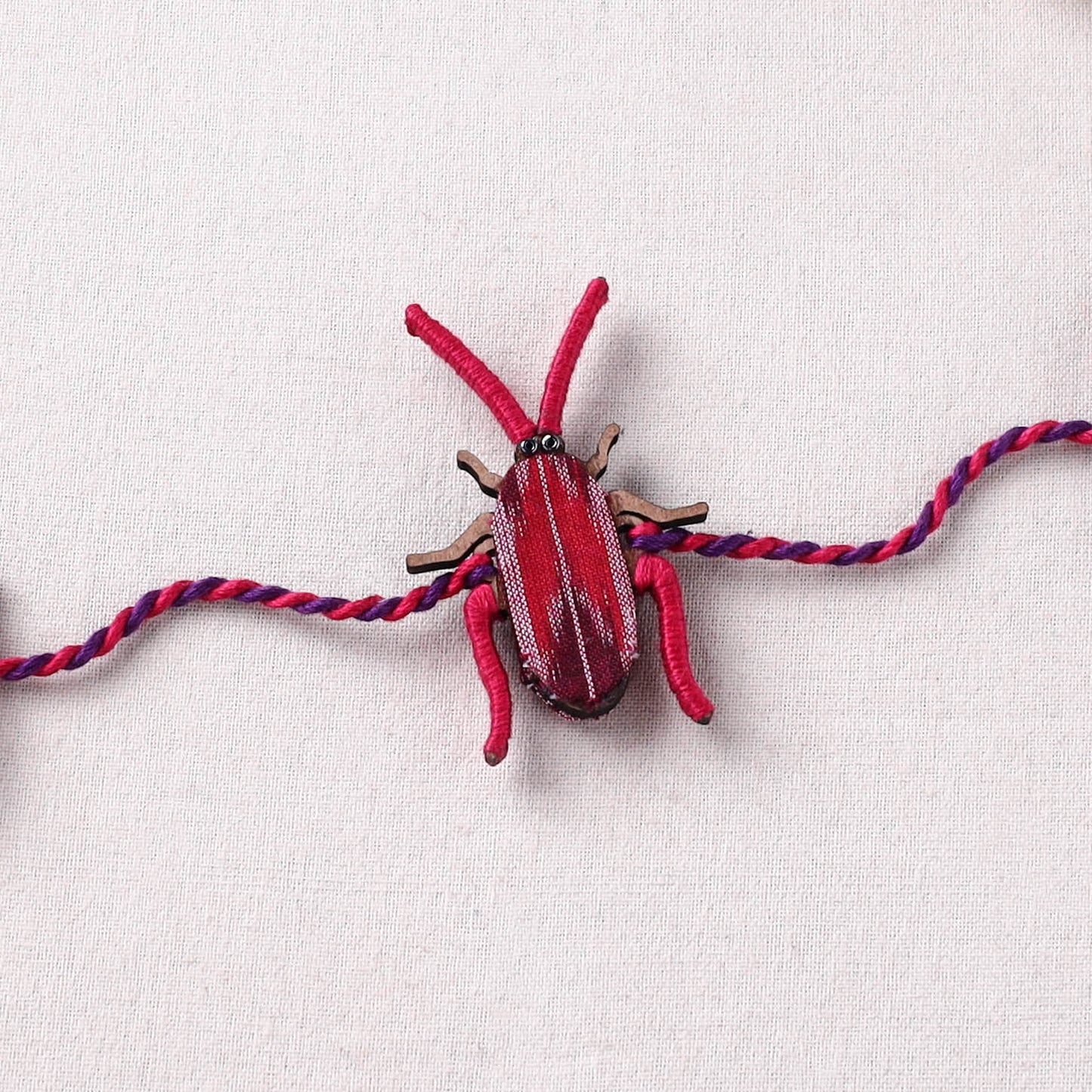 Cockroach - Reusable Handmade Threadwork Fabart Rakhi 03
