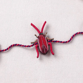 Cockroach - Reusable Handmade Threadwork Fabart Rakhi 03