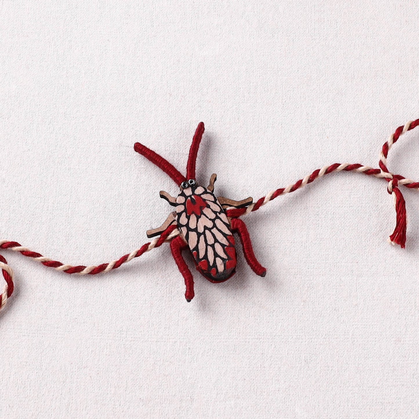 Cockroach - Reusable Handmade Threadwork Fabart Rakhi 04