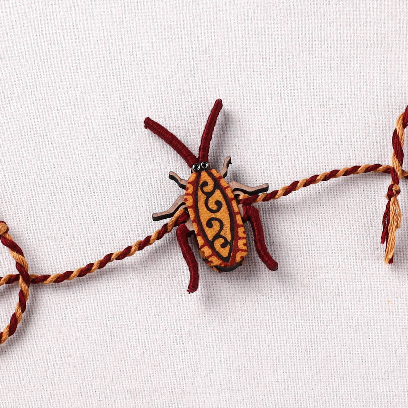 Cockroach - Reusable Handmade Threadwork Fabart Rakhi 05