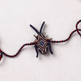 Cockroach - Reusable Handmade Threadwork Fabart Rakhi 06