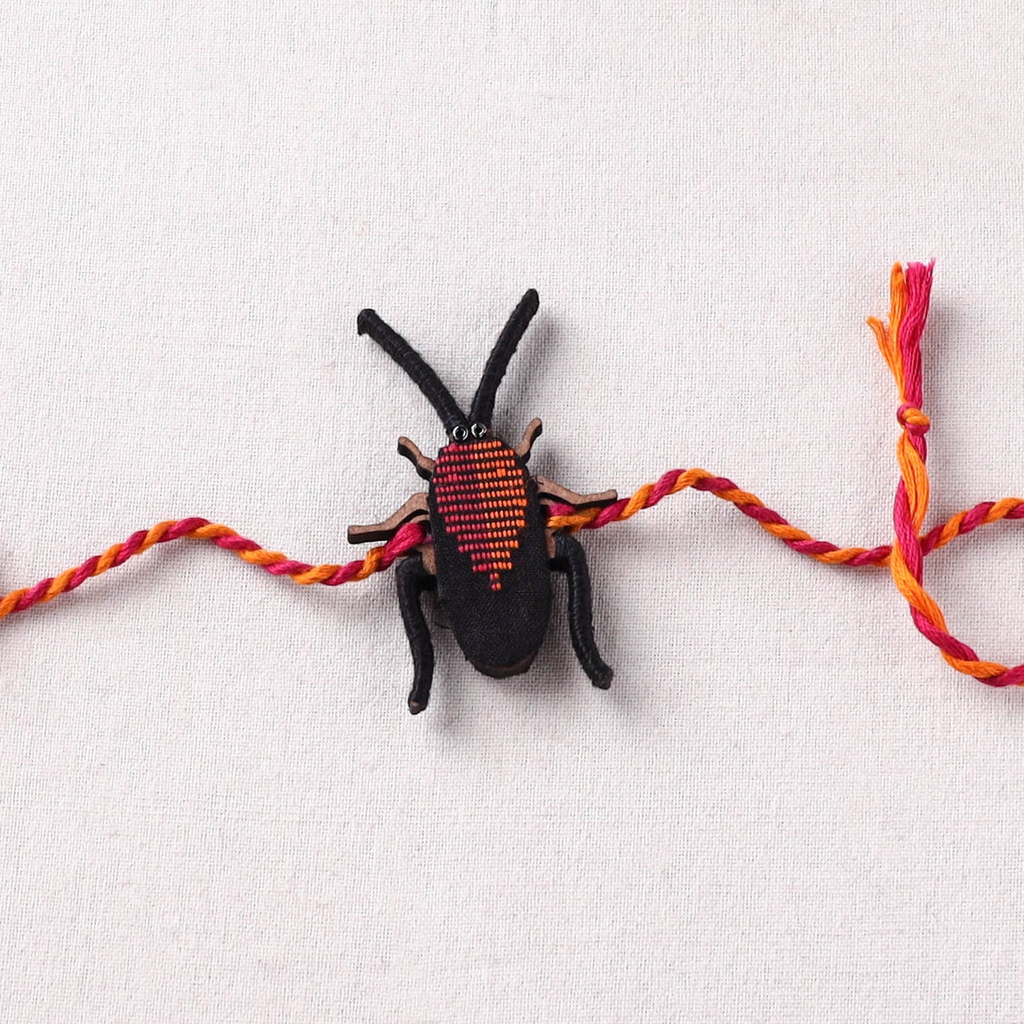 Cockroach - Reusable Handmade Threadwork Fabart Rakhi 07
