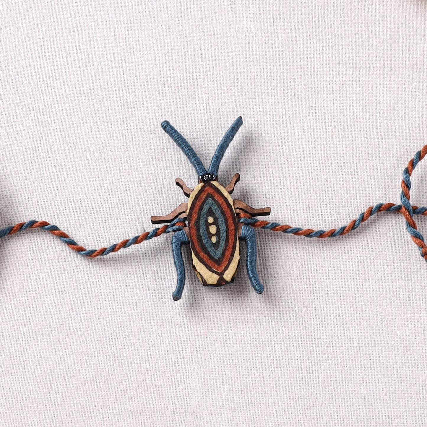 Cockroach - Reusable Handmade Threadwork Fabart Rakhi 08