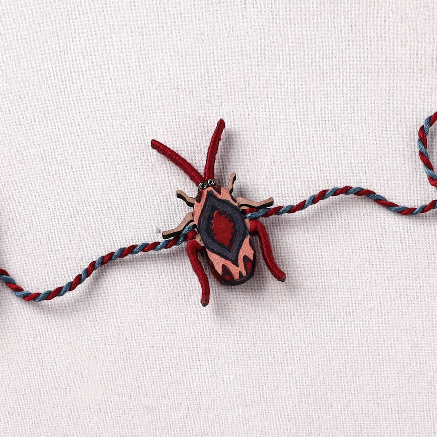 Cockroach - Reusable Handmade Threadwork Fabart Rakhi 10