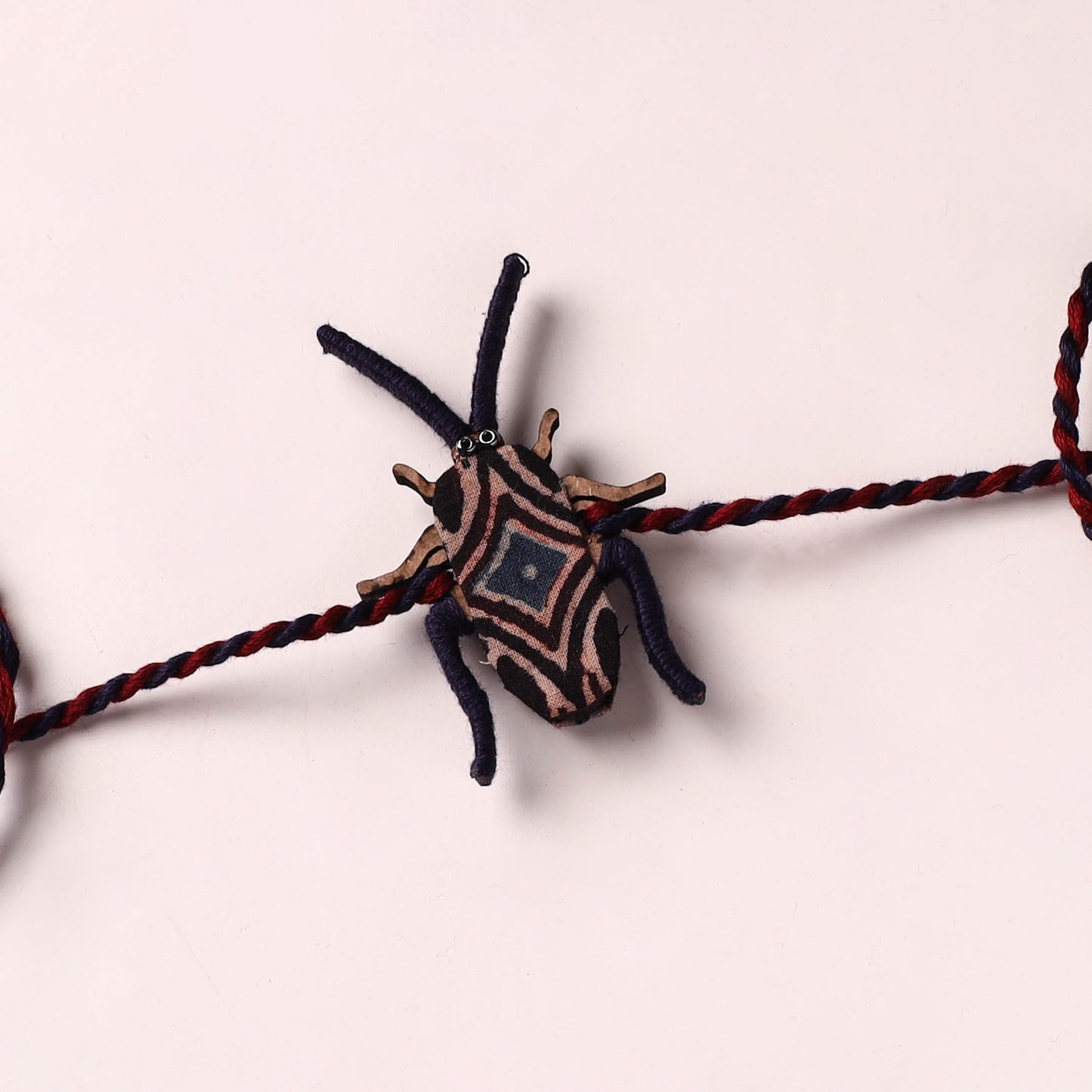 Cockroach - Reusable Handmade Threadwork Fabart Rakhi 06