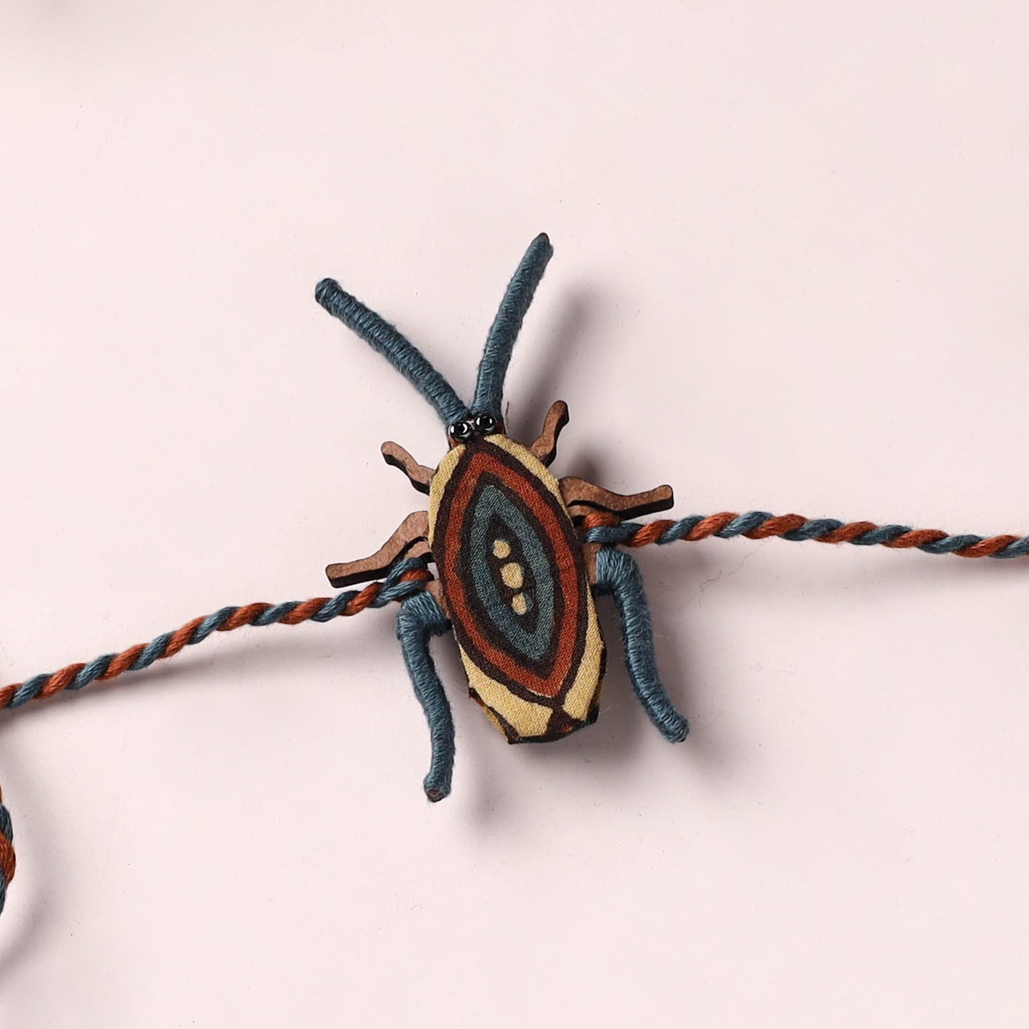 Cockroach - Reusable Handmade Threadwork Fabart Rakhi 08
