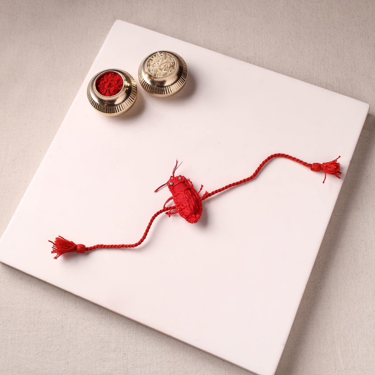 Cockroach - Reusable Handmade Threadwork Rakhi with Potli 01