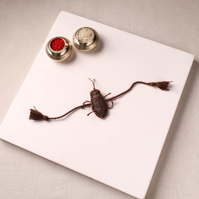 Cockroach - Reusable Handmade Threadwork Rakhi with Potli 02