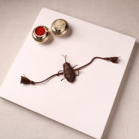 Cockroach - Reusable Handmade Threadwork Rakhi with Potli 02