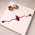 Cockroach - Reusable Handmade Threadwork Rakhi with Potli 03