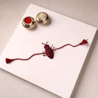 Cockroach - Reusable Handmade Threadwork Rakhi with Potli 03