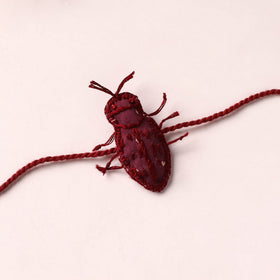Cockroach - Reusable Handmade Threadwork Rakhi with Potli 03