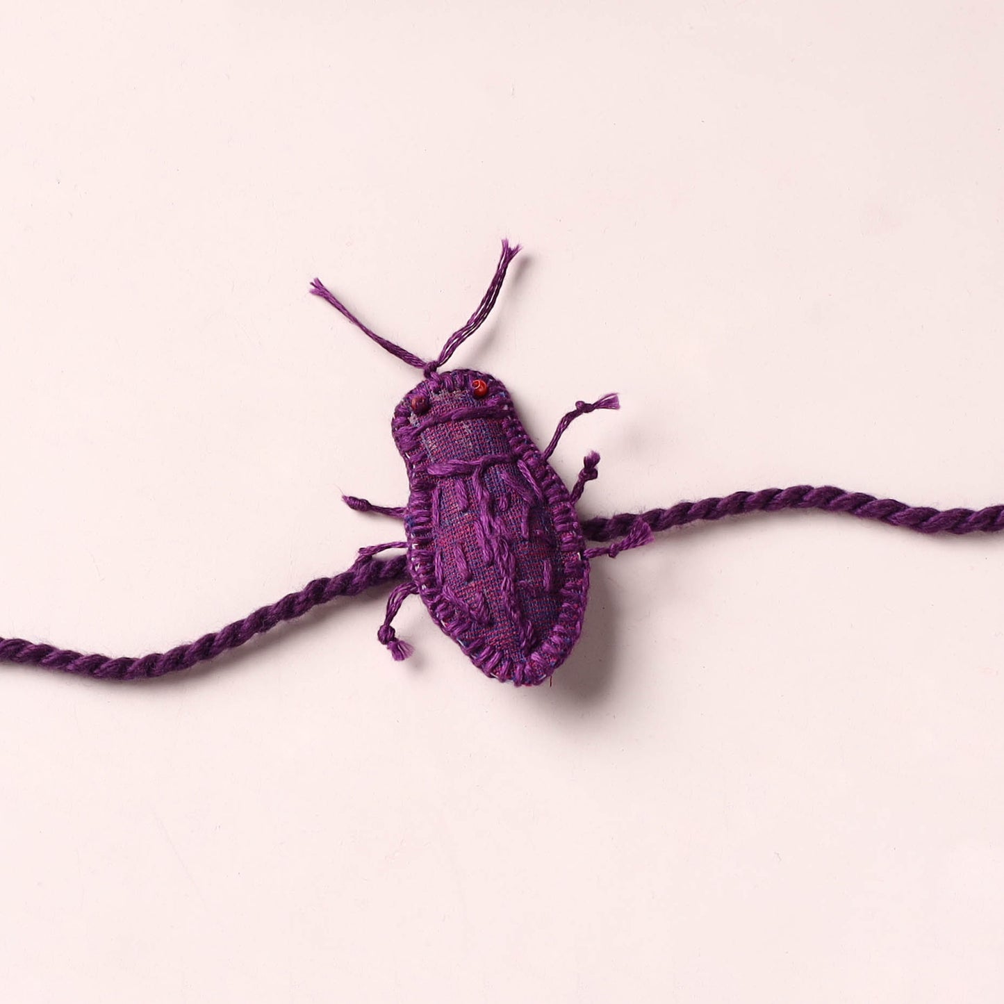 Cockroach - Reusable Handmade Threadwork Rakhi with Potli 04