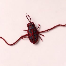 Cockroach - Reusable Handmade Threadwork Rakhi with Potli 07