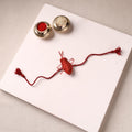 Cockroach - Reusable Handmade Threadwork Rakhi with Potli 08