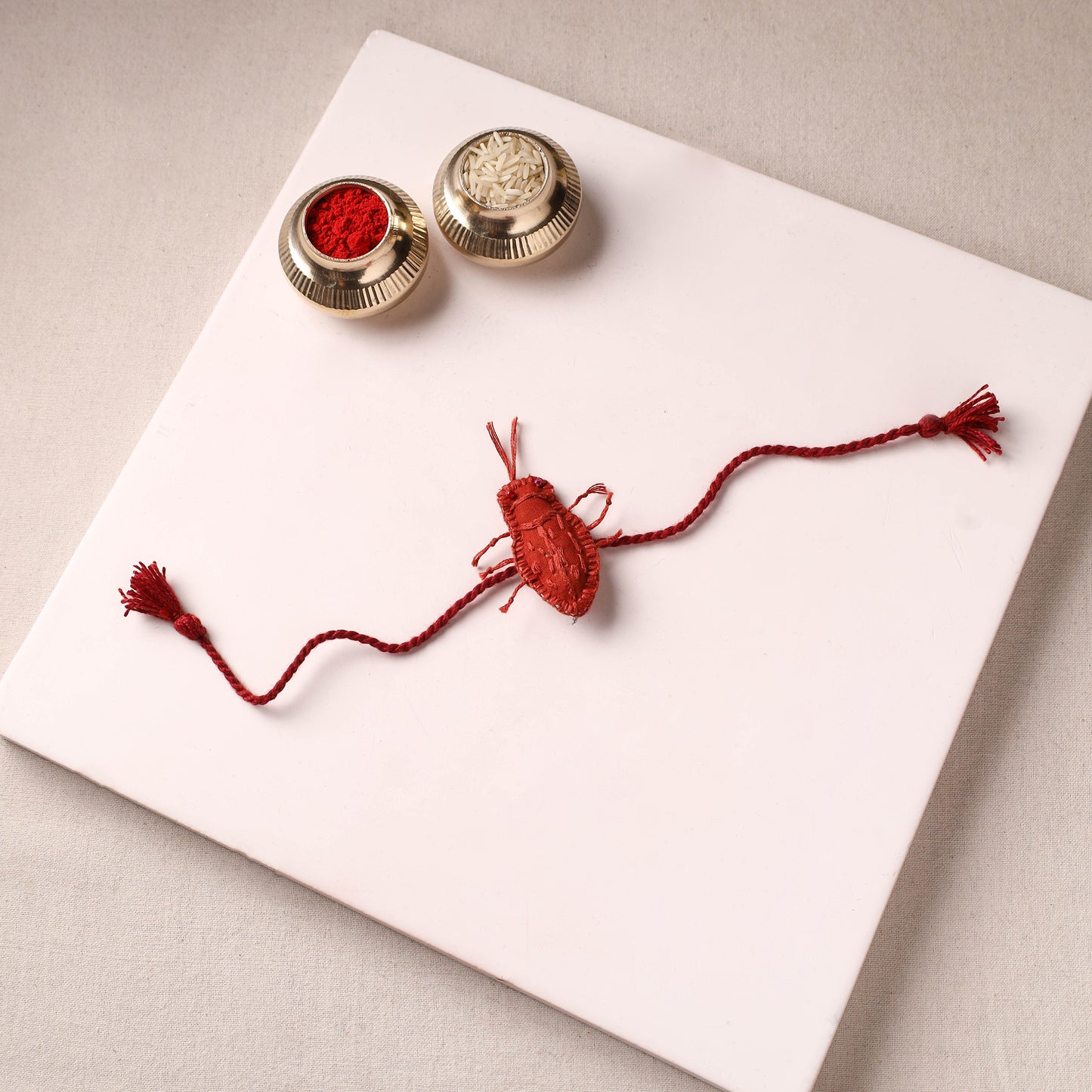 Cockroach - Reusable Handmade Threadwork Rakhi with Potli 08