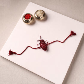 Cockroach - Reusable Handmade Threadwork Rakhi with Potli 09