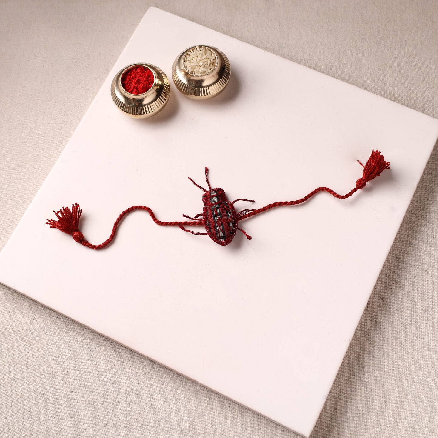 Cockroach - Reusable Handmade Threadwork Rakhi with Potli  10