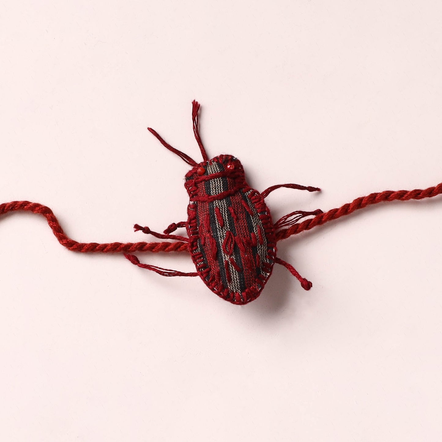 Cockroach - Reusable Handmade Threadwork Rakhi with Potli  10