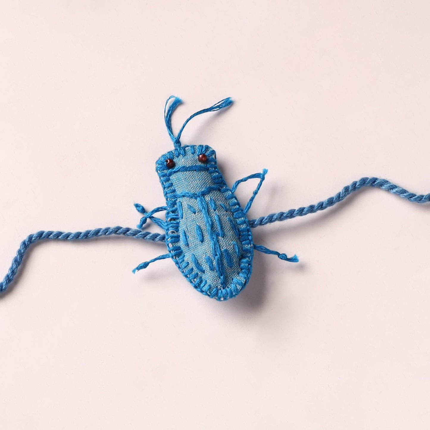 Cockroach - Reusable Handmade Threadwork Rakhi with Potli  11
