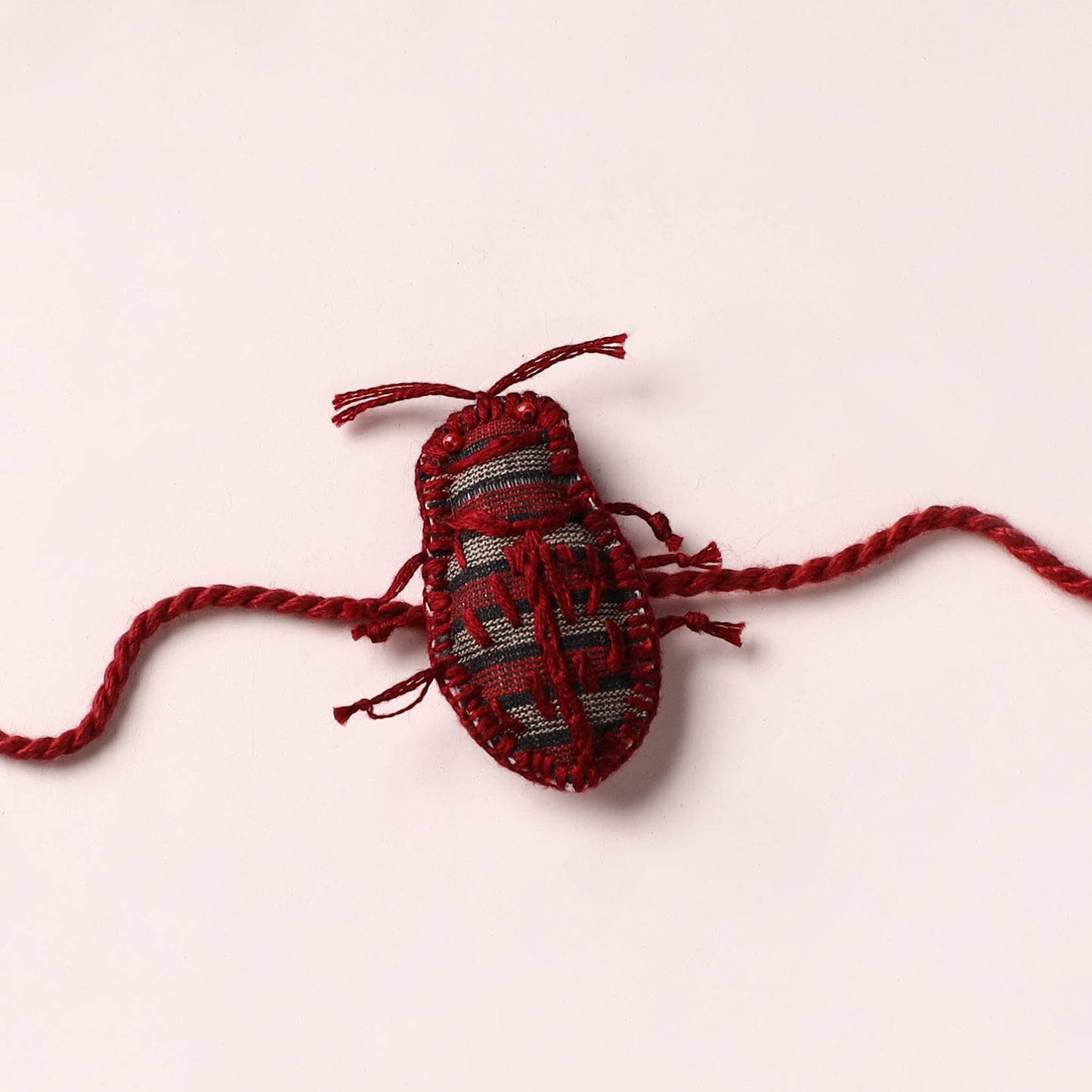 Cockroach - Reusable Handmade Threadwork Rakhi with Potli  15