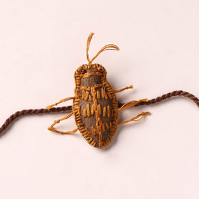Cockroach - Reusable Handmade Threadwork Rakhi with Potli  16